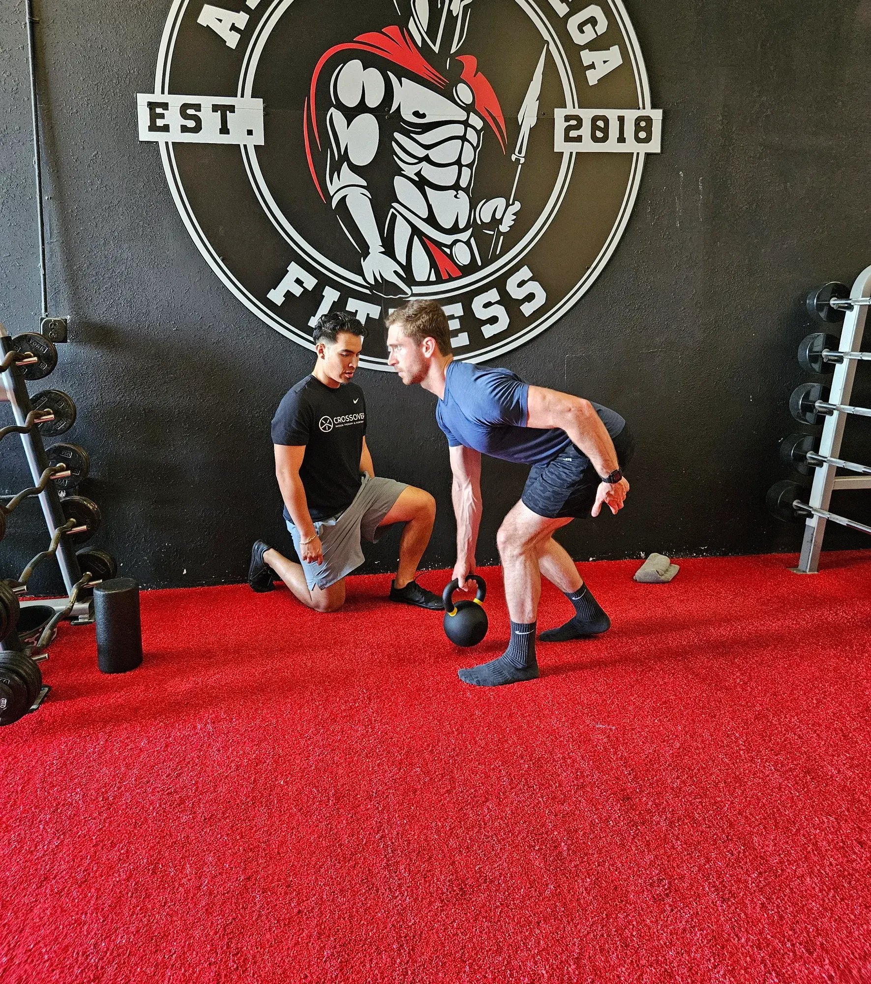 Ahlete working with physical therapist on movement assessment